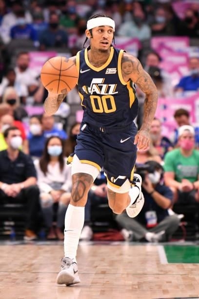 Jordan Clarkson of the Utah Jazz dribbles the ball during a preseason game against the Dallas Mavericks on October 6, 2021 at the American Airlines...