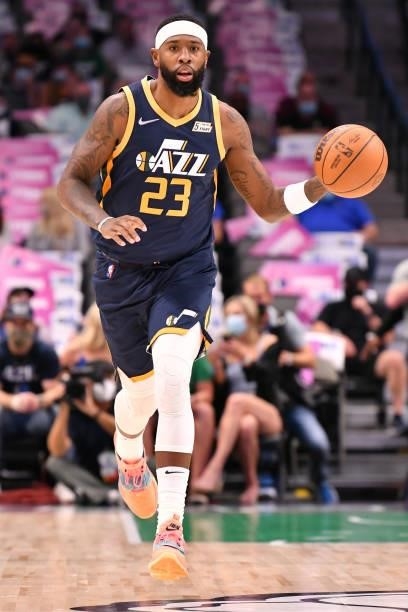 Royce O'Neale of the Utah Jazz drives to the basket during a preseason game against the Dallas Mavericks on October 6, 2021 at the American Airlines...