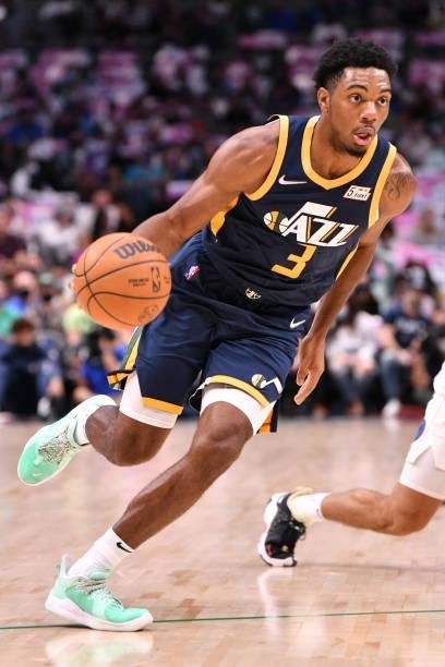 Trent Forrest of the Utah Jazz drives to the basket during a preseason game against the Dallas Mavericks on October 6, 2021 at the American Airlines...