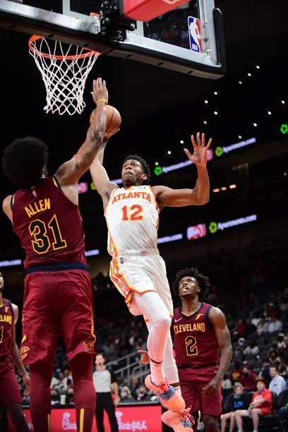 De'Andre Hunter of the Atlanta Hawks dunks the ball during a preseason game against the Cleveland Cavaliers on October 6, 2021 at State Farm Arena in...