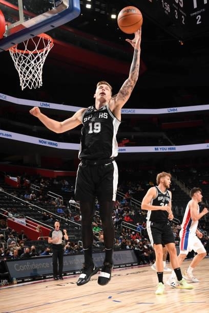 Luka Samanic of the San Antonio Spurs catches the rebound during a preseason game against the Detroit Pistons on October 6, 2021 at Little Caesars...