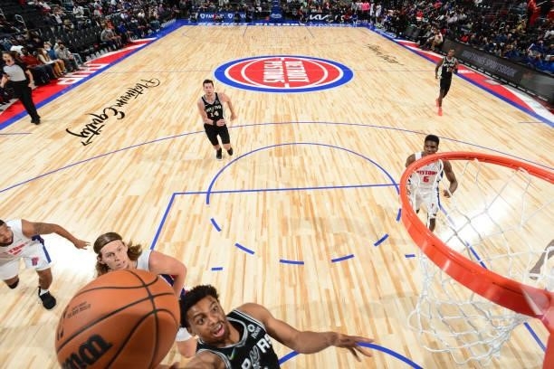 Keldon Johnson of the San Antonio Spurs drives to the basket during a preseason game against the Detroit Pistons on October 6, 2021 at Little Caesars...