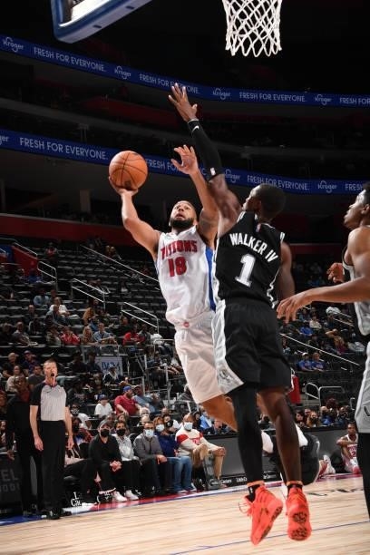 Cory Joseph of the Detroit Pistons shoots the ball during a preseason game against the San Antonio Spurs on October 6, 2021 at Little Caesars Arena...
