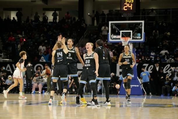 The Chicago Sky celebrates during the game against the Connecticut Sun during Game 4 of the 2021 WNBA Semifinals on October 6, 2021 at the Wintrust...