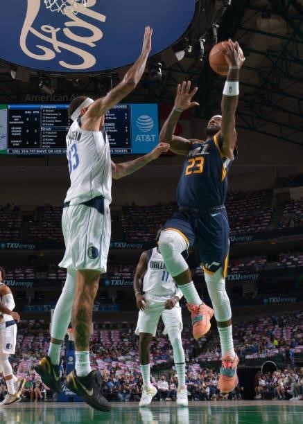 Royce O'Neale of the Utah Jazz drives to the basket during a preseason game against the Dallas Mavericks on October 6, 2021 at the American Airlines...