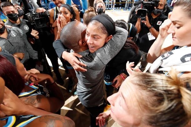 Candace Parker of the Chicago Sky and Head Coach James Wade of the Chicago Sky embrace after winning Game Four of the 2021 WNBA Semifinals on October...