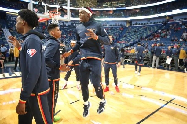 Zylan Cheatham of the New Orleans Pelicans high fives before the preseason game against the Orlando Magic on October 6, 2021 at the Smoothie King...