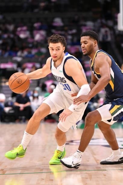 JaQuori McLaughlin of the Dallas Mavericks drives to the basket during a preseason game against the Utah Jazz on October 6, 2021 at the American...