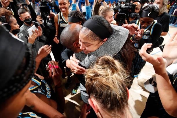 Candace Parker of the Chicago Sky and Head Coach James Wade of the Chicago Sky embrace after winning Game Four of the 2021 WNBA Semifinals on October...