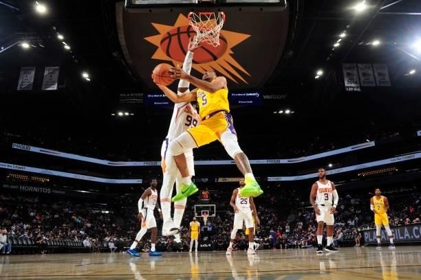 Talen Horton-Tucker of the Los Angeles Lakers drives to the basket against the Phoenix Suns during a preseason game on October 6, 2021 at Footprint...