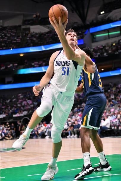 Boban Marjanovic of the Dallas Mavericks drives to the basket during a preseason game against the Utah Jazz on October 6, 2021 at the American...