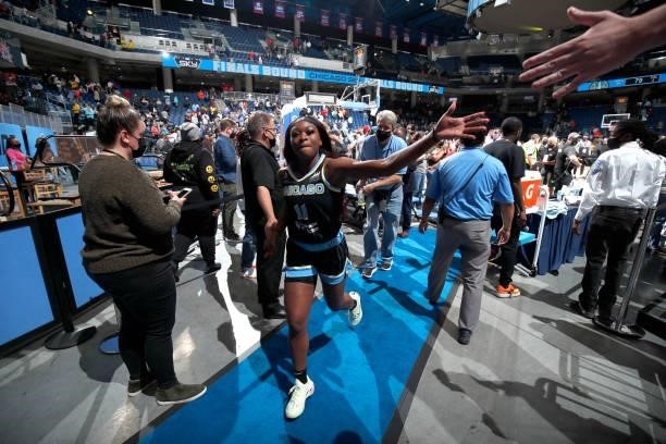Dana Evans of the Chicago Sky celebrates after winning Game Four of the 2021 WNBA Semifinals on October 6, 2021 at the Wintrust Arena in Chicago,...