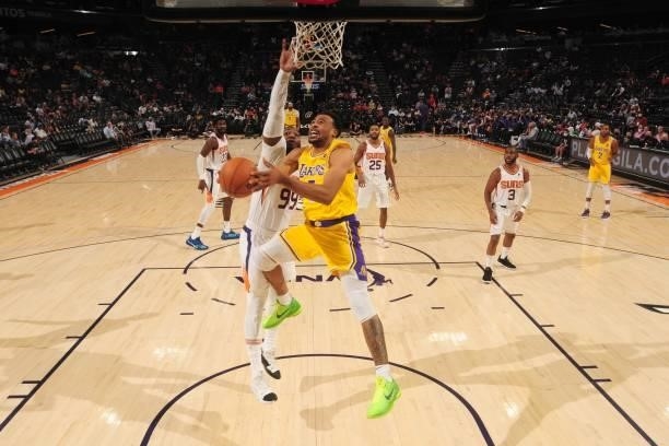 Talen Horton-Tucker of the Los Angeles Lakers drives to the basket against the Phoenix Suns during a preseason game on October 6, 2021 at Footprint...