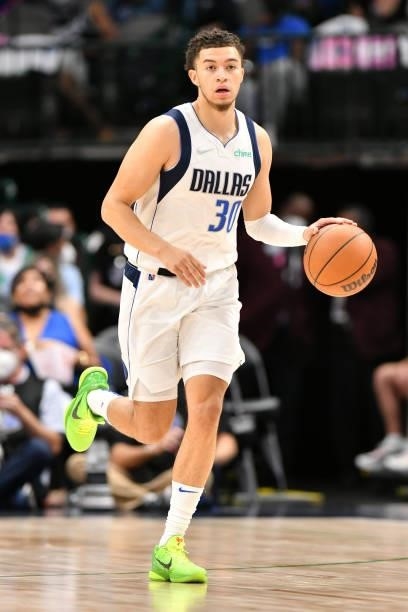 JaQuori McLaughlin of the Dallas Mavericks dribbles the ball during a preseason game against the Utah Jazz on October 6, 2021 at the American...