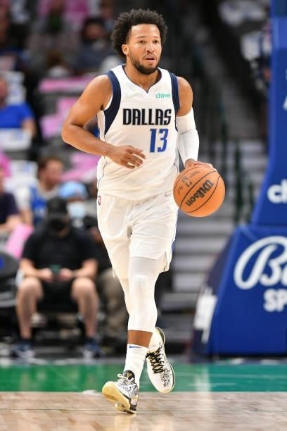 Jalen Brunson of the Dallas Mavericks dribbles the ball during a preseason game against the Utah Jazz on October 6, 2021 at the American Airlines...