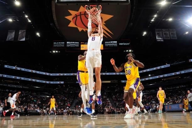 Frank Kaminsky of the Phoenix Suns dunks the ball against the Los Angeles Lakers during a preseason game on October 6, 2021 at Footprint Center in...