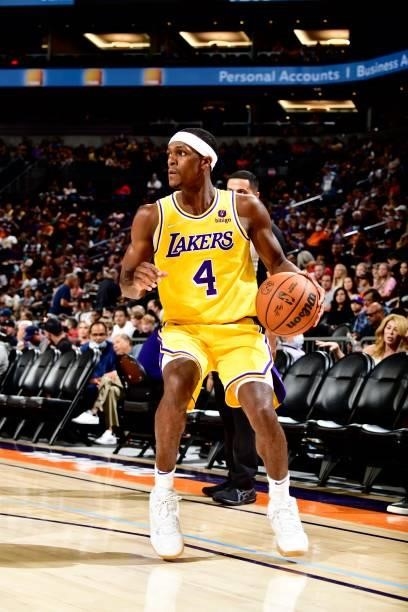 Rajon Rondo of the Los Angeles Lakers handles the ball against the Phoenix Suns during a preseason game on October 6, 2021 at Footprint Center in...