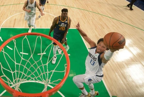 Jalen Brunson of the Dallas Mavericks drives to the basket during a preseason game against the Utah Jazz on October 6, 2021 at the American Airlines...