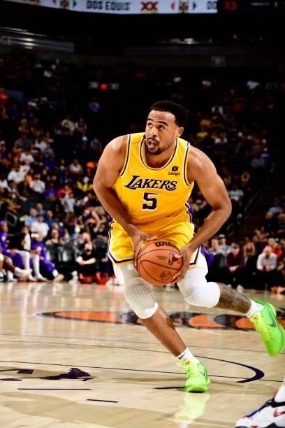 Talen Horton-Tucker of the Los Angeles Lakers handles the ball against the Phoenix Suns during a preseason game on October 6, 2021 at Footprint...