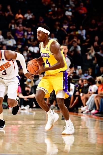 Rajon Rondo of the Los Angeles Lakers handles the ball against the Phoenix Suns during a preseason game on October 6, 2021 at Footprint Center in...