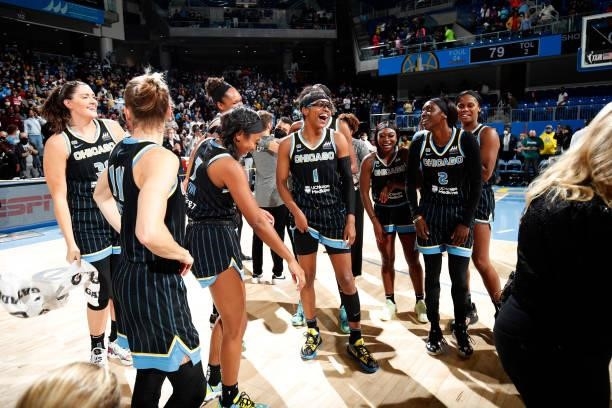Diamond DeShields and the Chicago Sky celebrate after winning Game Four of the 2021 WNBA Semifinals on October 6, 2021 at the Wintrust Arena in...