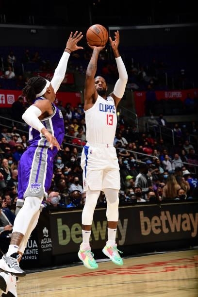 Paul George of the LA Clippers shoots the ball against the Sacramento Kings during a preseason game on October 6, 2021 at STAPLES Center in Los...