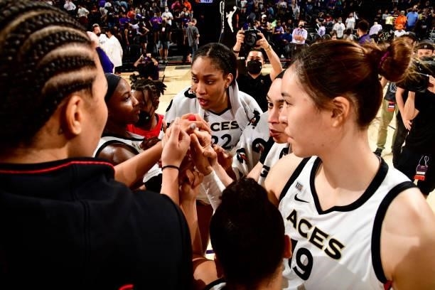 Ja Wilson and the Las Vegas Aces huddle up after winning Game Four of the 2021 WNBA Semifinals on October 6, 2021 at Footprint Center in Phoenix,...