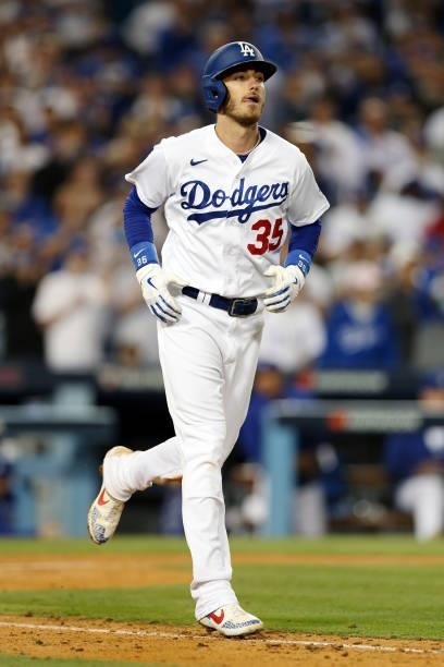Cody Bellinger of the Los Angeles Dodgers reacts after being walked in the bottom of the ninth inning during the game between the St. Louis Cardinals...