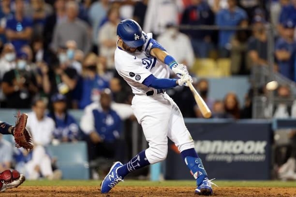 Chris Taylor of the Los Angeles Dodgers hits a two-run home run in the bottom of the ninth inning as the Dodgers defeat the St. Louis Cardinals 3-1...