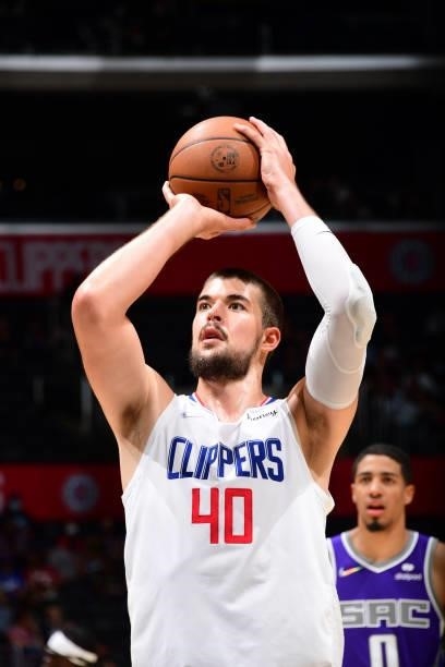Ivica Zubac of the LA Clippers shoots the ball against the Sacramento Kings during a preseason game on October 6, 2021 at STAPLES Center in Los...