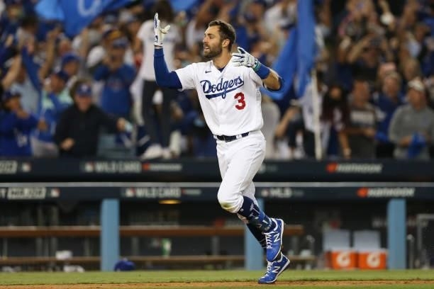 Chris Taylor of the Los Angeles Dodgers celebrates after hitting a two-run home run in the bottom of the ninth inning as the Dodgers defeat the St....