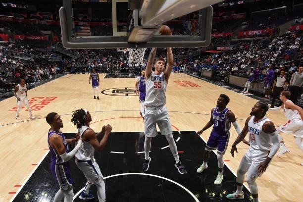 Isaiah Hartenstein of the LA Clippers grabs the rebound against the Sacramento Kings during a preseason game on October 6, 2021 at STAPLES Center in...