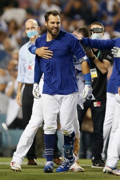 Chris Taylor of the Los Angeles Dodgers celebrates after hitting a two-run home run in the bottom of the ninth inning as the Dodgers defeat the St....