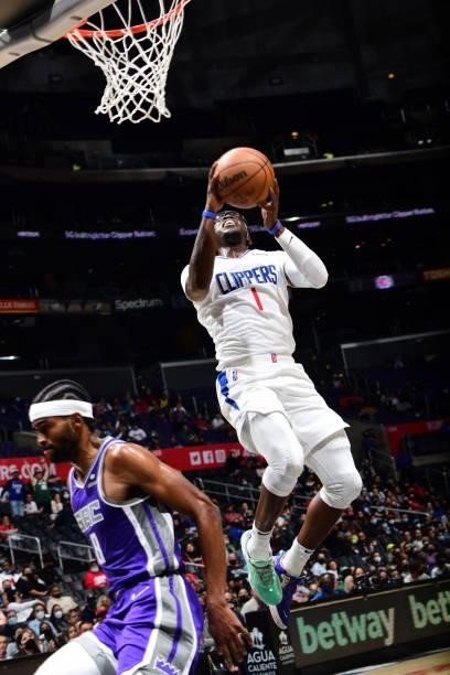 Reggie Jackson of the LA Clippers drives to the basket against the Sacramento Kings during a preseason game on October 6, 2021 at STAPLES Center in...