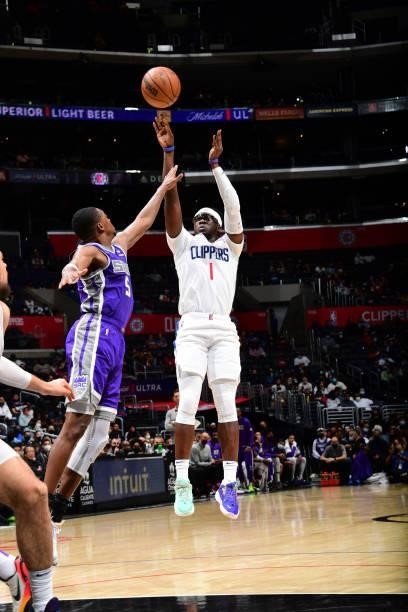 Reggie Jackson of the LA Clippers shoots the ball against the Sacramento Kings during a preseason game on October 6, 2021 at STAPLES Center in Los...