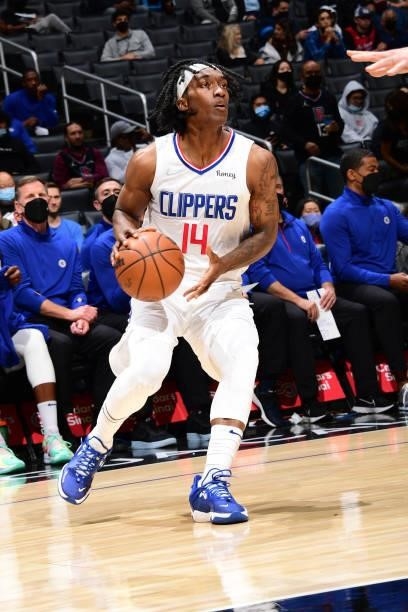 Terance Mann of the LA Clippers handles the ball against the Sacramento Kings during a preseason game on October 6, 2021 at STAPLES Center in Los...