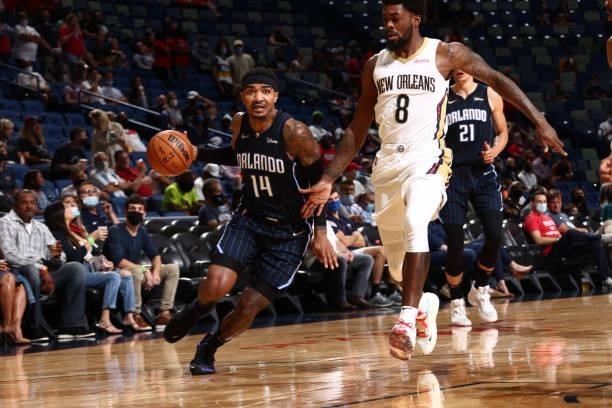 Gary Harris of the Orlando Magic drives to the basket against the New Orleans Pelicans during a preseason game on October 6, 2021 at the Smoothie...