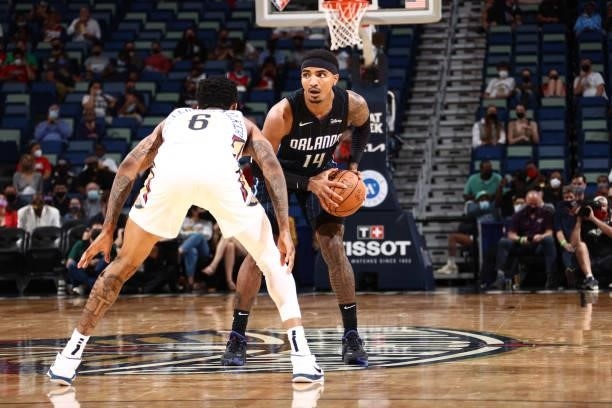 Gary Harris of the Orlando Magic handles the ball against the New Orleans Pelicans during a preseason game on October 6, 2021 at the Smoothie King...