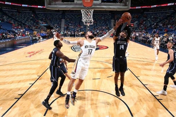 Gary Harris of the Orlando Magic grabs the rebound against the New Orleans Pelicans during a preseason game on October 6, 2021 at the Smoothie King...