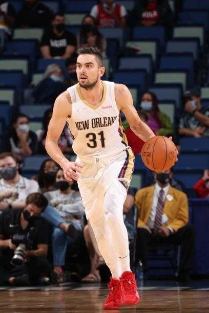 Tomas Satoransky of the New Orleans Pelicans handles the ball against the Orlando Magic during a preseason game on October 6, 2021 at the Smoothie...