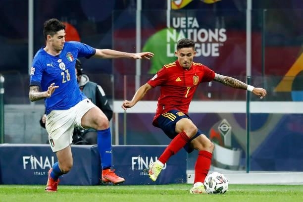 Alessandro Bastoni of Italy and Yeremi Pino of Spain battle for the ball during the UEFA Nations League Semi-Final match between the Italy and Spain...