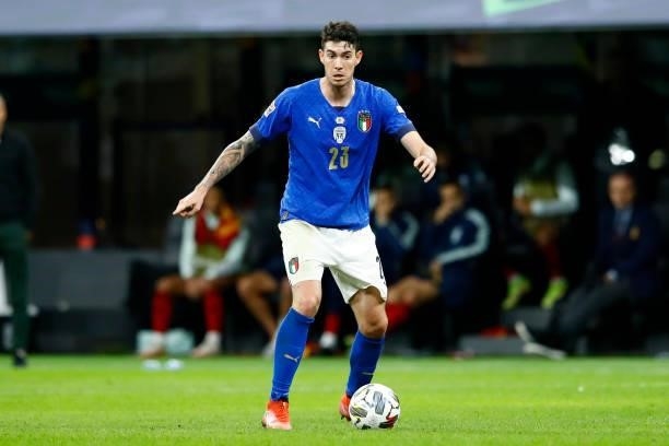 Alessandro Bastoni of Italy controls the ball during the UEFA Nations League Semi-Final match between the Italy and Spain at San Siro Stadium on...