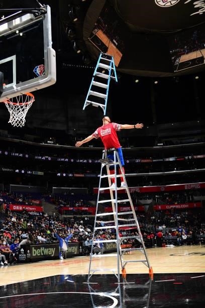 An act performs at halftime during a preseason game between the Sacramento Kings and the LA Clippers on October 6, 2021 at STAPLES Center in Los...