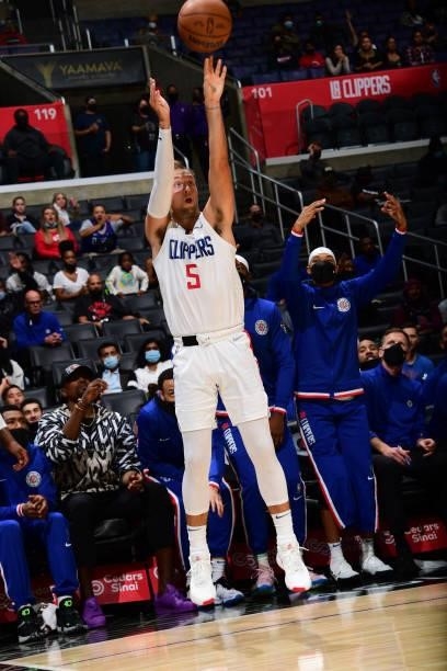 Luke Kennard of the LA Clippers shoots a 3-pointer against the Sacramento Kings during a preseason game on October 6, 2021 at STAPLES Center in Los...