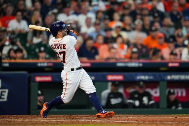 Jose Altuve of the Houston Astros hits a double in the fourth inning during Game 1 of the ALDS between the Chicago White Sox and the Houston Astros...