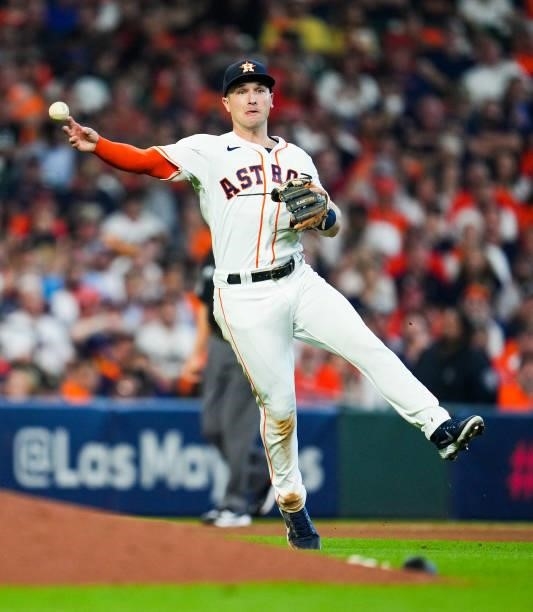 Alex Bregman of the Houston Astros throws to first during Game 1 of the ALDS between the Chicago White Sox and the Houston Astros at Minute Maid Park...