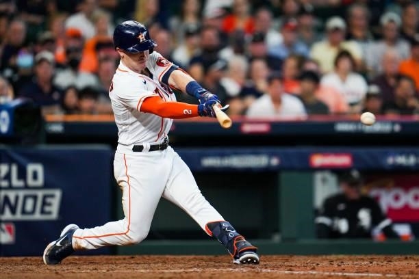 Alex Bregman of the Houston Astros hits a single in the sixth inning during Game 1 of the ALDS between the Chicago White Sox and the Houston Astros...
