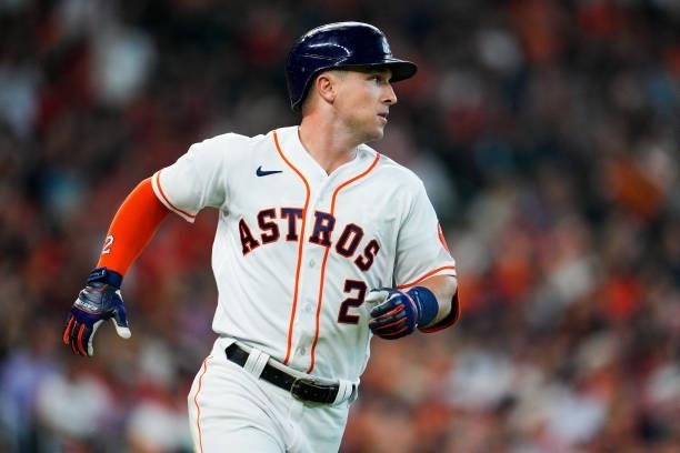 Alex Bregman of the Houston Astros reaches first after hitting a single in the sixth inning during Game 1 of the ALDS between the Chicago White Sox...