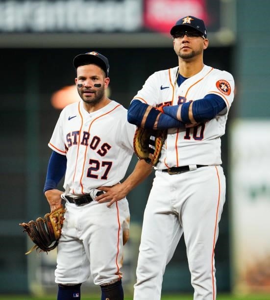 Jose Altuve of the Houston Astros and Yuli Gurriel look on during Game 1 of the ALDS between the Chicago White Sox and the Houston Astros at Minute...