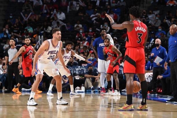 Georges Niang of the Philadelphia 76ers plays defense against the Toronto Raptors during a preseason game on October 7, 2021 at Wells Fargo Center in...